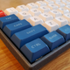 These DSA Penumbra-esque keycaps from AliExpress (with a separate novelty key for Esc) totally changed the look of my budget board.
